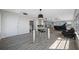 Open concept living area with hardwood floors and ample natural light at 6363 Gulf Winds Dr # 437, St Pete Beach, FL 33706