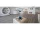 Bright living area with hardwood floors and modern furniture at 6363 Gulf Winds Dr # 437, St Pete Beach, FL 33706