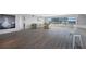 Open living space showcasing hardwood floors and ample natural light at 6363 Gulf Winds Dr # 437, St Pete Beach, FL 33706