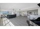Open living space with hardwood floors, dining area, and city views at 6363 Gulf Winds Dr # 437, St Pete Beach, FL 33706