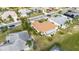 Aerial view of single-Gathering home with surrounding landscape and neighborhood at 719 Winterbrooke Way, Sun City Center, FL 33573