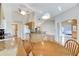 Kitchen with granite countertops and a dining area at 719 Winterbrooke Way, Sun City Center, FL 33573