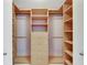Large walk-in closet with shelves and hanging rods at 719 Winterbrooke Way, Sun City Center, FL 33573