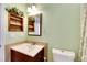 Small bathroom with single vanity and shower/tub combo at 719 Winterbrooke Way, Sun City Center, FL 33573