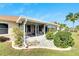 Enclosed porch with pebble garden and beautiful backyard views at 719 Winterbrooke Way, Sun City Center, FL 33573