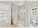 View of the shower and toilet, with bedroom in the background at 13110 Homestead Ln, Parrish, FL 34219