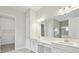 Bathroom with double vanity and large mirror at 13110 Homestead Ln, Parrish, FL 34219