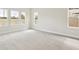 Spacious bedroom with ample natural light from the large, bright windows at 13110 Homestead Ln, Parrish, FL 34219