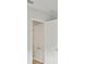 Interior view featuring a closet with doors, neutral walls, and laminated floors at 13110 Homestead Ln, Parrish, FL 34219