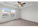 Bright bedroom with carpet and ceiling fan at 18001 Richmond Place Dr # 734, Tampa, FL 33647