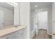 Bathroom with vanity and tub/shower combo at 18001 Richmond Place Dr # 734, Tampa, FL 33647