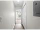 Hallway with doors leading to other rooms at 18001 Richmond Place Dr # 734, Tampa, FL 33647