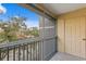 Screened balcony with views of the community and trees at 18001 Richmond Place Dr # 734, Tampa, FL 33647