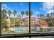 View of community pool and residential buildings at 18001 Richmond Place Dr # 734, Tampa, FL 33647