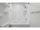 Bathroom featuring a bathtub and shower at 18001 Richmond Place Dr # 734, Tampa, FL 33647