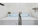 Laundry room with washer and dryer at 18001 Richmond Place Dr # 734, Tampa, FL 33647