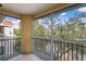 Screened balcony with views of the community and trees at 18001 Richmond Place Dr # 734, Tampa, FL 33647