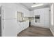 Community kitchen with white cabinets and modern appliances at 18001 Richmond Place Dr # 734, Tampa, FL 33647