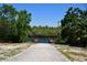 Concrete boat ramp leading to the water at 3204 Stagecoach Trl, Wimauma, FL 33598
