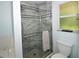 Modern bathroom featuring a walk-in shower with pebble flooring at 3204 Stagecoach Trl, Wimauma, FL 33598