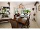 Bright dining room with sliding doors leading to a view of the pool at 3204 Stagecoach Trl, Wimauma, FL 33598