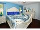 Serene main bedroom with a king-size bed and en-suite bathroom at 3204 Stagecoach Trl, Wimauma, FL 33598