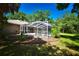 Relaxing pool and patio area screened for privacy and comfort at 3204 Stagecoach Trl, Wimauma, FL 33598