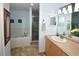 Updated bathroom features a soaking tub, walk-in shower, and dual vanities at 3204 Stagecoach Trl, Wimauma, FL 33598