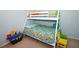 Bedroom with twin-over-twin bunk beds and colorful decor at 3204 Stagecoach Trl, Wimauma, FL 33598
