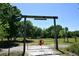 Entrance to Sundance Park with arched gate at 3204 Stagecoach Trl, Wimauma, FL 33598