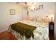 King-size bedroom with wood floors and large closet at 3204 Stagecoach Trl, Wimauma, FL 33598