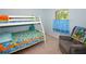 Bedroom with twin-over-twin bunk beds, and a gray recliner at 3204 Stagecoach Trl, Wimauma, FL 33598