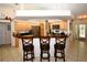 Spacious kitchen with an island, stainless steel appliances, and granite countertops at 3204 Stagecoach Trl, Wimauma, FL 33598