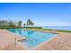 Sparkling community lap pool with bay views at 4993 Bacopa S Ln # 705, St Petersburg, FL 33715