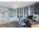 Spacious home office with built-in shelves and desk at 4993 Bacopa S Ln # 705, St Petersburg, FL 33715