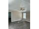 Spacious living room featuring vinyl flooring and ceiling fan at 11911 Rhodine Rd, Riverview, FL 33579