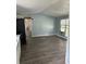Bright kitchen with modern appliances and vinyl flooring at 11911 Rhodine Rd, Riverview, FL 33579