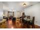 Open floor plan featuring wood flooring throughout the living and dining spaces at 1321 Bluewater Dr, Sun City Center, FL 33573