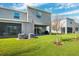 View of backyard with patio and AC units at 16701 Maude Dr, Wimauma, FL 33598