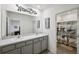 Double vanity bathroom with shower/tub combo at 16701 Maude Dr, Wimauma, FL 33598