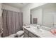 Bathroom with shower, toilet and vanity at 16701 Maude Dr, Wimauma, FL 33598