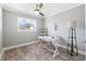 Bright home office features wood-look floors and built-in shelving at 7343 Brookview Cir, Tampa, FL 33634