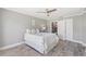 Bedroom with ensuite bathroom and neutral decor at 7343 Brookview Cir, Tampa, FL 33634