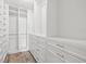 Spacious walk-in closet with ample shelving and drawers at 7343 Brookview Cir, Tampa, FL 33634