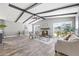 Spacious living room with vaulted ceiling and fireplace at 7343 Brookview Cir, Tampa, FL 33634