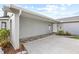 House exterior with walkway and landscaping at 7343 Brookview Cir, Tampa, FL 33634