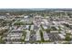Aerial view of an apartment complex with a pool near a waterfront at 7701 Starkey Rd # 324, Seminole, FL 33777