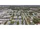 Aerial view of apartment complex and surrounding neighborhood at 7701 Starkey Rd # 324, Seminole, FL 33777