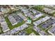 Aerial view of an apartment complex with a pool and ample parking at 7701 Starkey Rd # 324, Seminole, FL 33777