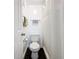 Clean and simple bathroom with shower/tub combo and white toilet at 7701 Starkey Rd # 324, Seminole, FL 33777